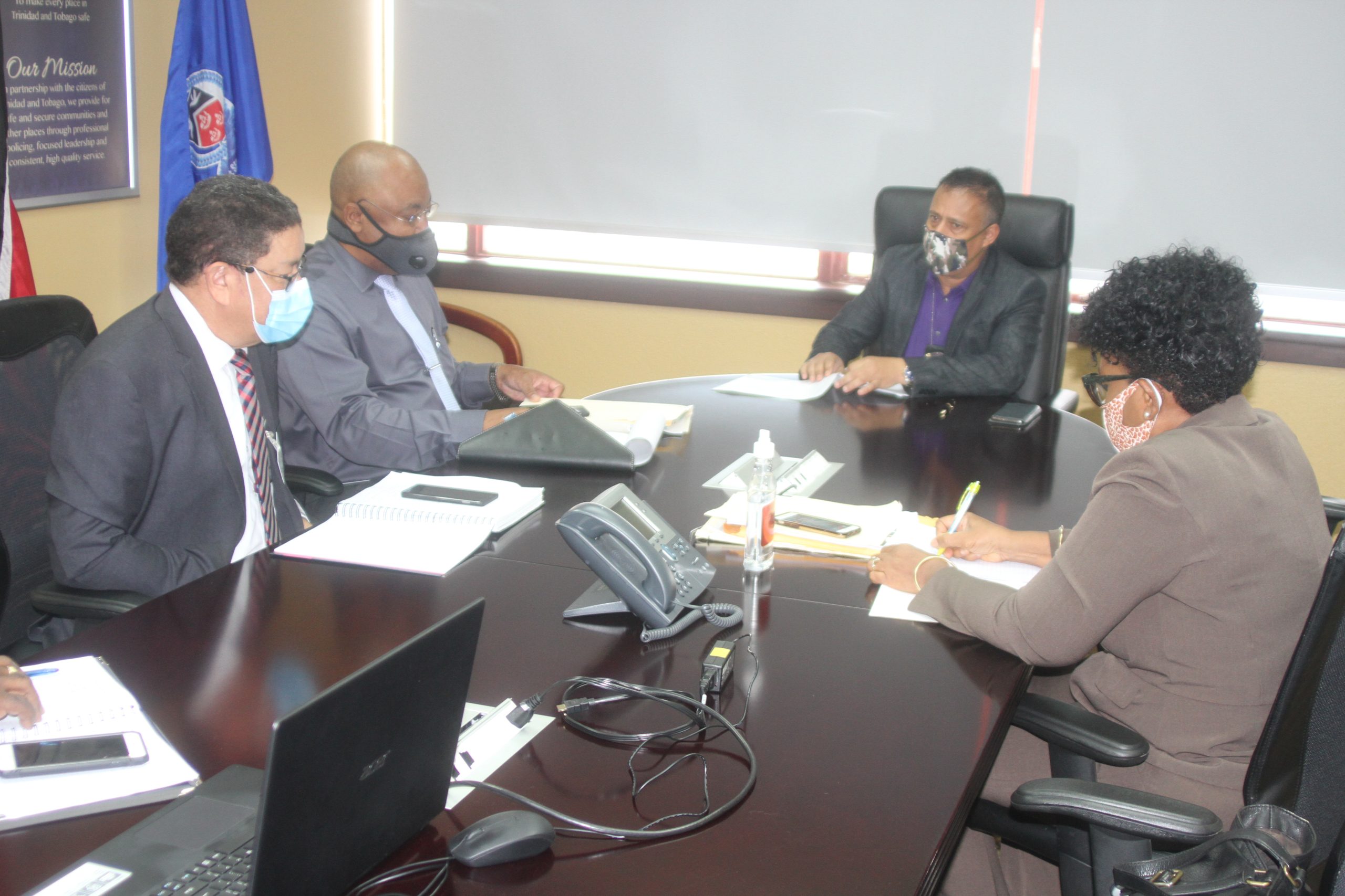 Commissioner of Police Gary Griffith, ACP, Specialized Support, Joanne Archie, CEO Alan Poon King