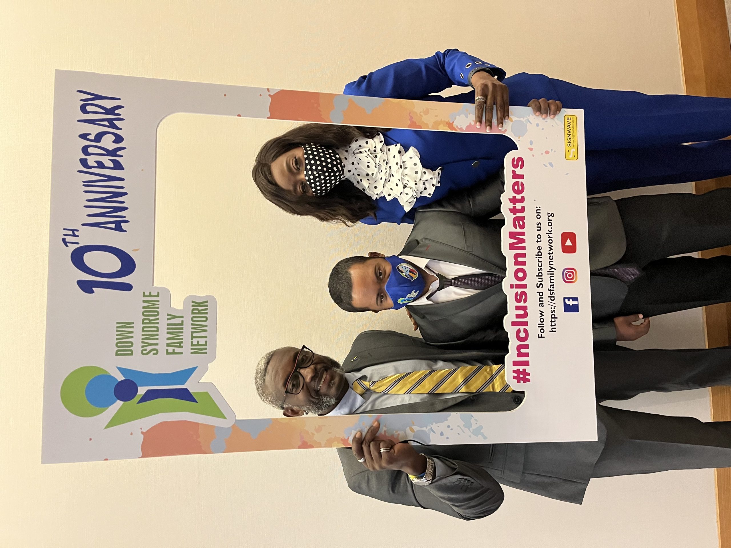 Down Syndrome Family Network President Glen Niles, Tyrese Niles and Minister Cox celebrate World Down Syndrome Day