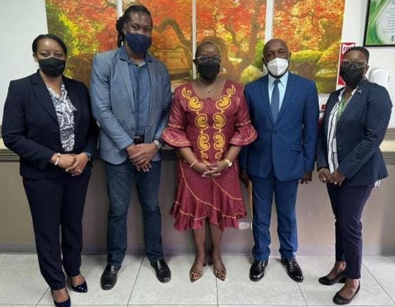 From left Permanent Secretary Claire Davidson-Williams,Minister in the Ministry of Housing Adrian Leonce, Minister of Housing Camille Robinson-Regis, EPOSDC Chairman Newman George and EPOSDC Managing Director, Dr Deborah Thomas-Austin