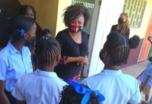 Students of Toco R.C. Primary School chat with Education Minister Dr. Nyan Gadsby-Dolly