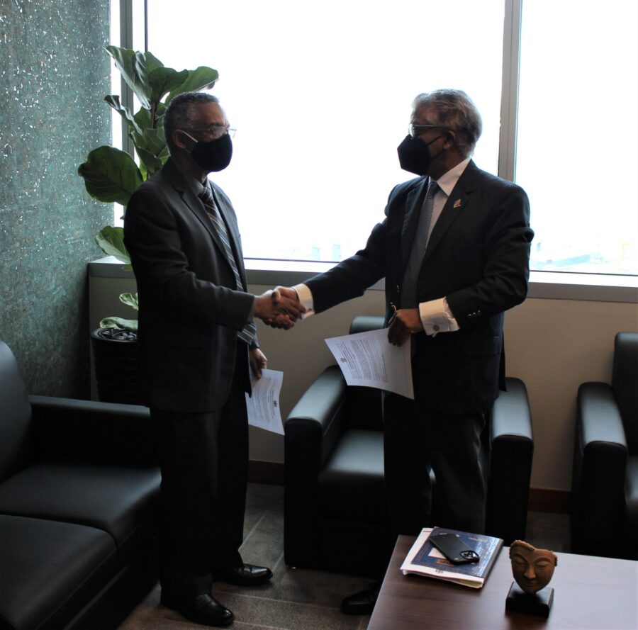Attorney General Reginald Armour in his chambers with Chief Parliamentary Counsel Ian Macintyre. Photo: Office of Attorney General and Ministry of Legal Affairs