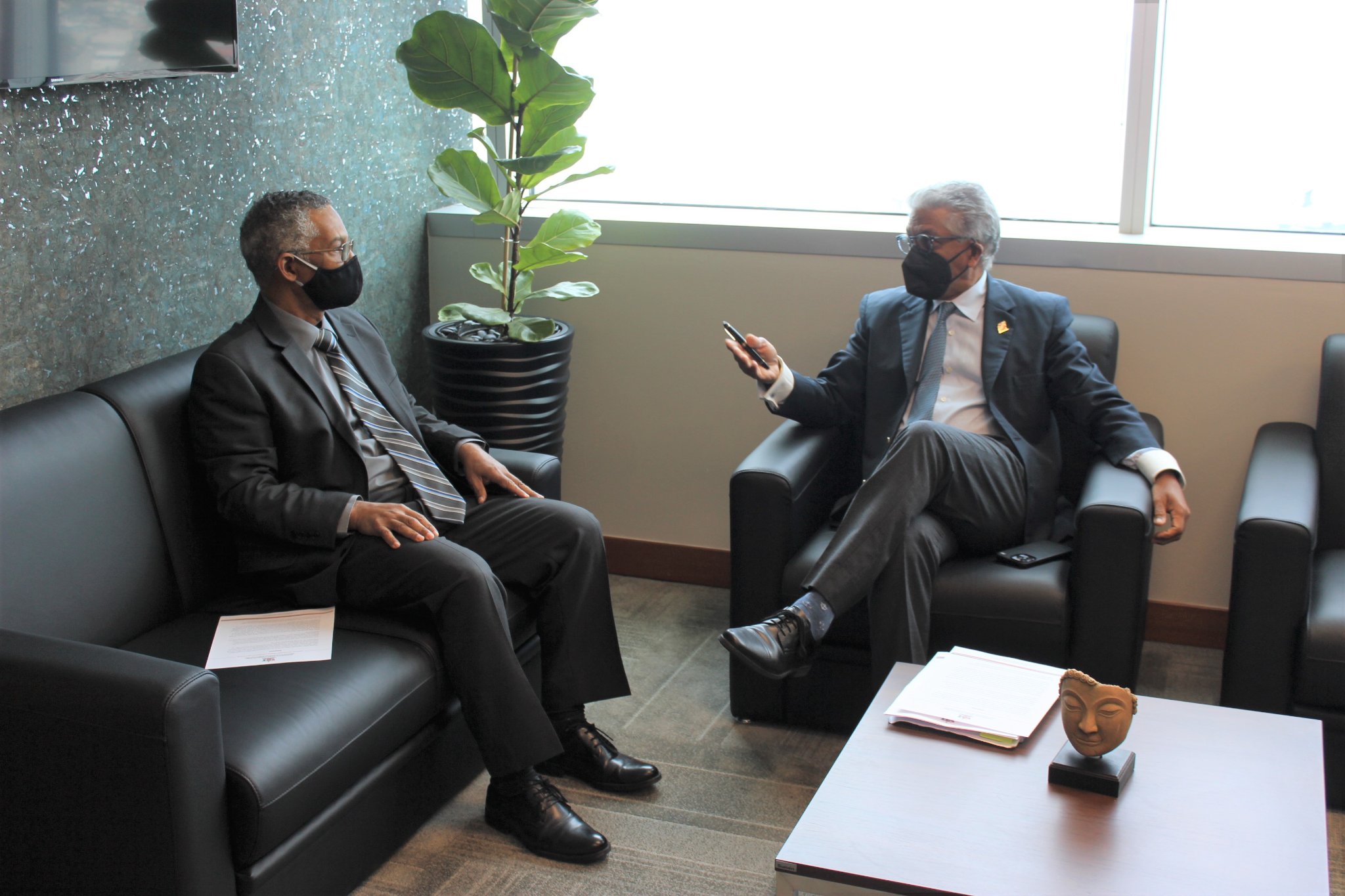 Attorney General Reginald Armour in his chambers with Chief Parliamentary Counsel Ian Macintyre. Photo: Office of Attorney and Ministry of Legal 