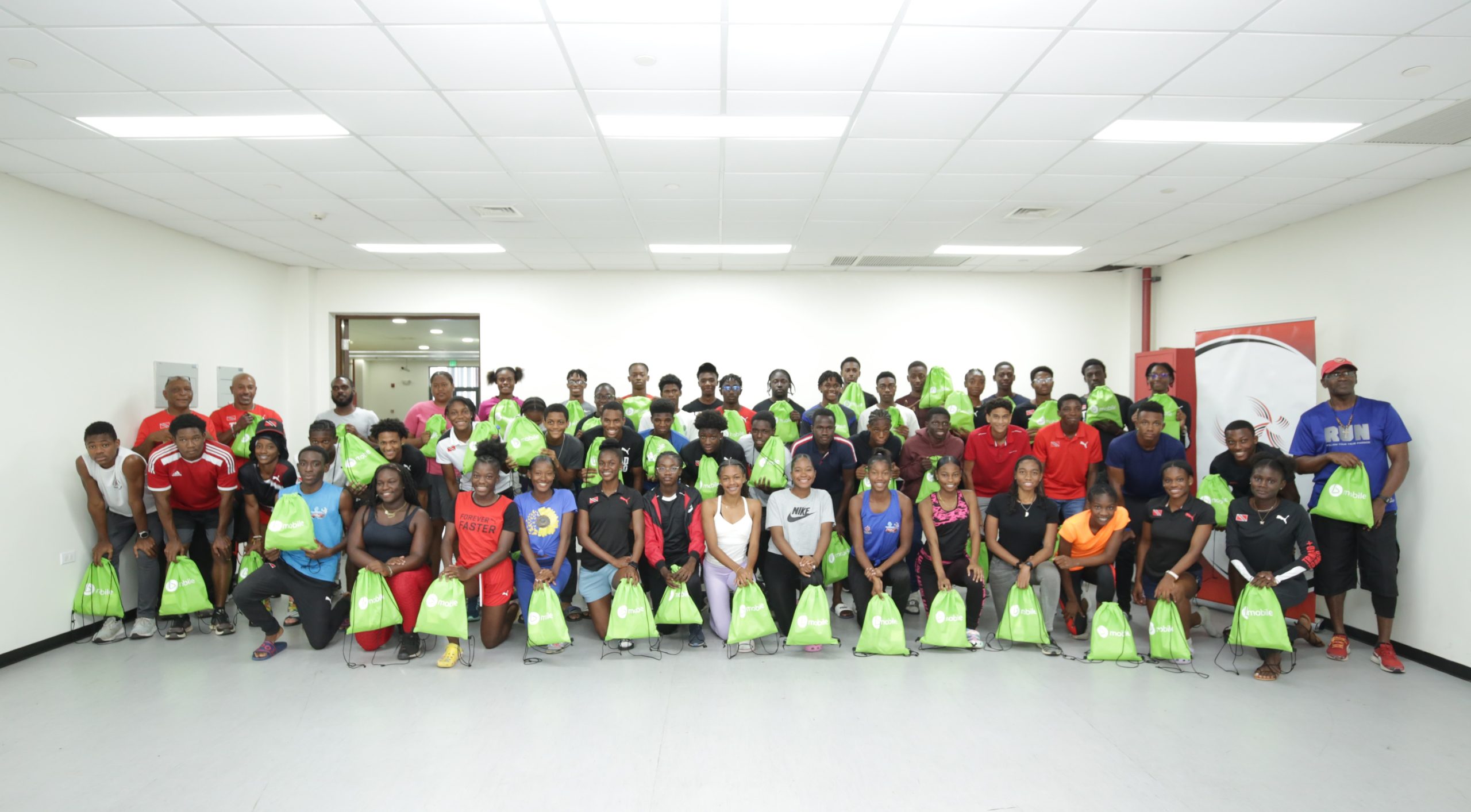 1. Trinidad and Tobago 2023 CARIFTA team all smiles as they get ready to make the nation proud