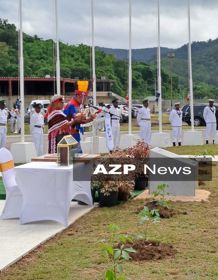 Santa Rosa First People Community saying a prayer at the flag raising ceremony to celebrate the 50th Anniversary of CARICOM at the Chaguaramas Convention Centre