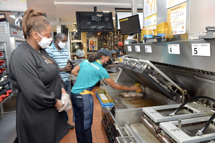 Content Creator and Brand Ambassador for McDonald’s Trinidad Anastasia Mootoo bites into the newly evovled tasting burger