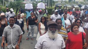 Ex-Caroni Workers protest outside the office of the Ministry of Agriculture in Chaguanas on Wednesday