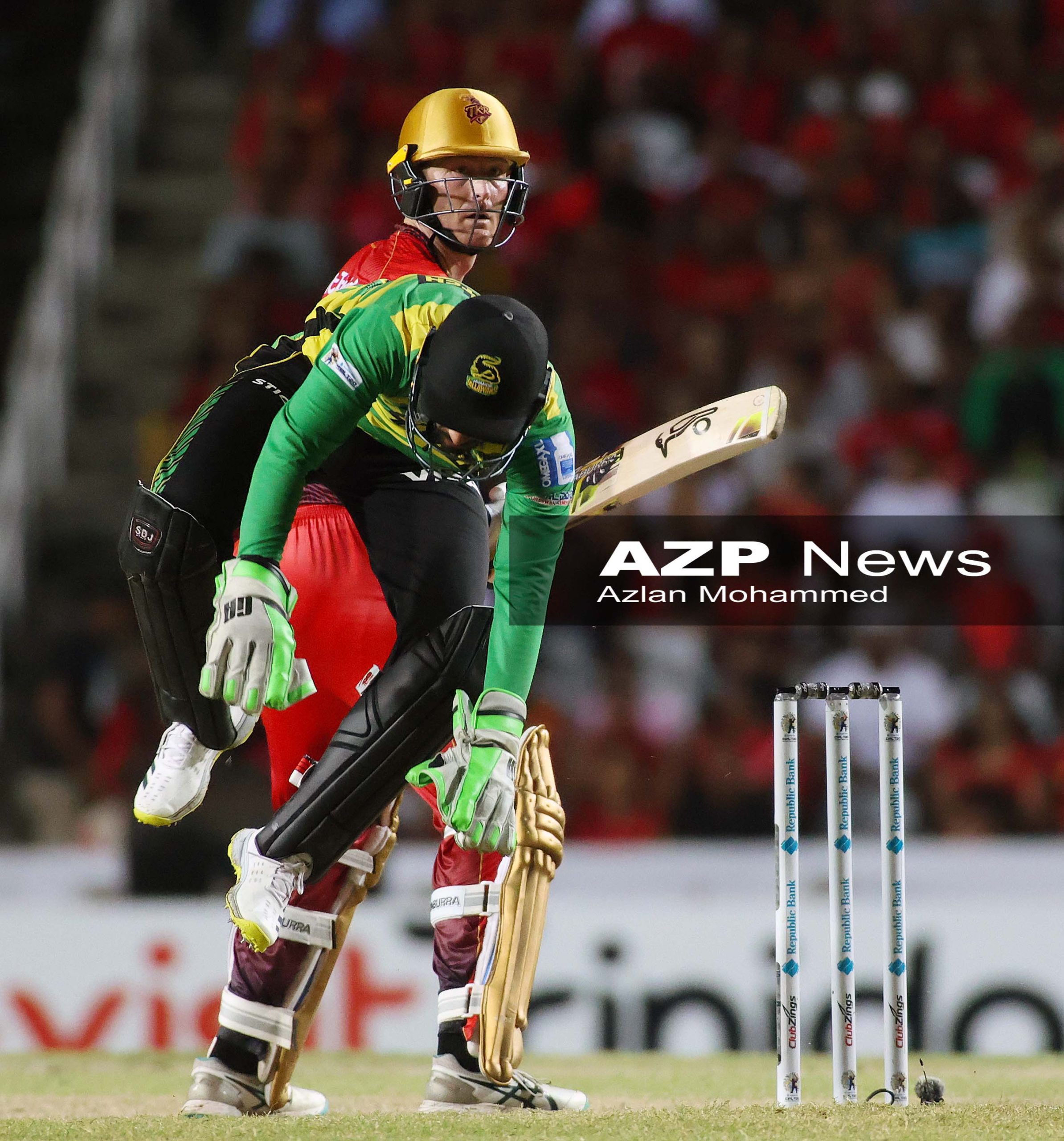 Martin Guptill flicks over a diving wkp S Brooks