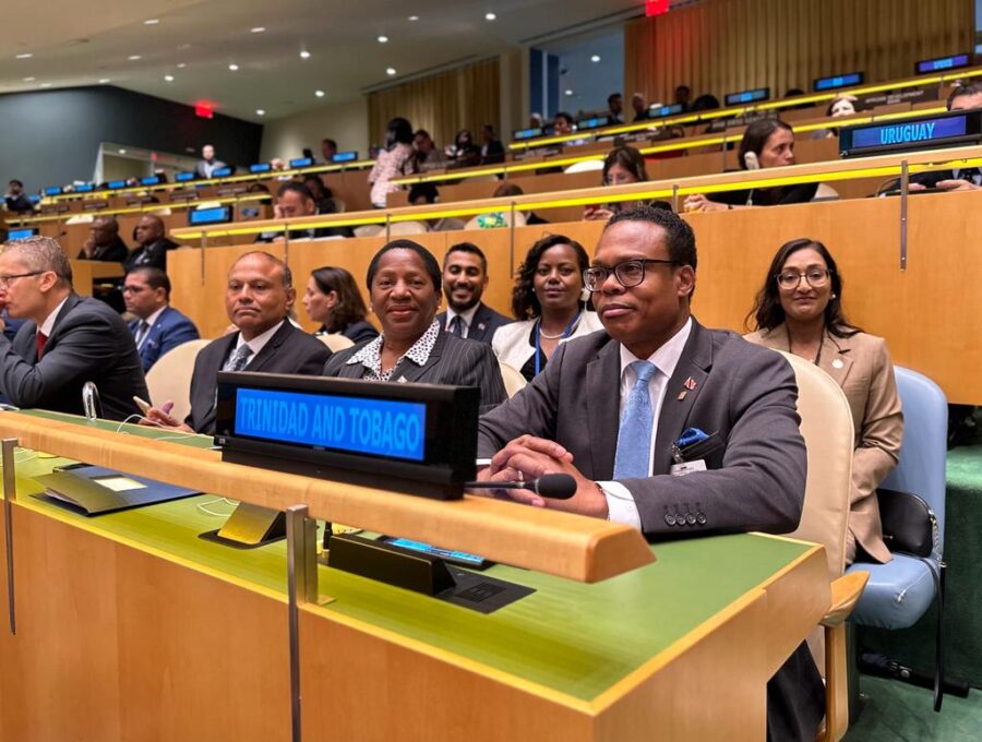 Minister of CARICOM and Foreign Affairs, right, sitting next to Minister of Planning and Development Pennelope Beckles