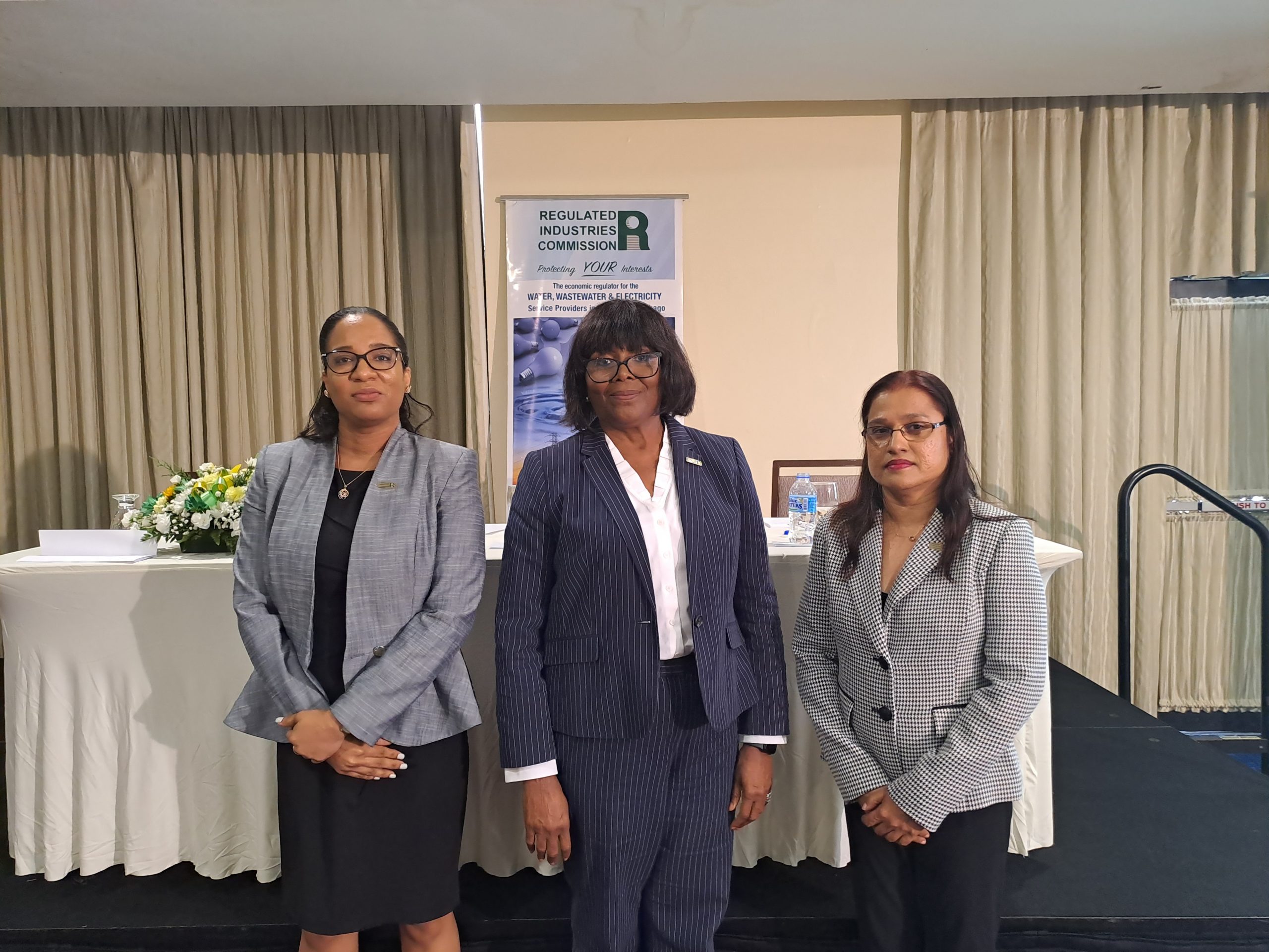 RIC Chairman Dawn Callender, centre, with Executive Director Dr Michelle Salandy, left and Deputy Executive Director Carol Balkaran