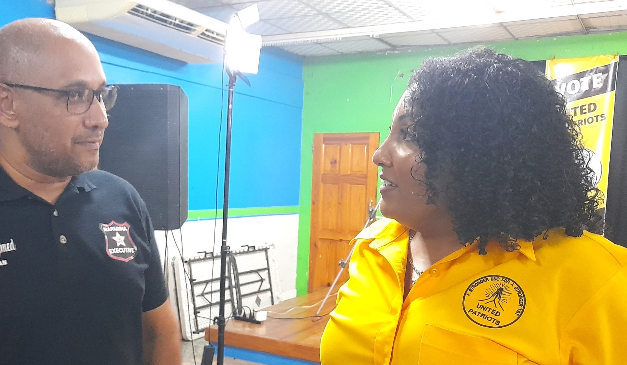 Candidate for UNC Deputy Political Leader under the United Patriots slate Anita Haynes (right) speaks with Chairman of the Naparima constituency executive Shazan Mohammed at the Macaulay Community Centre on Thursday night.