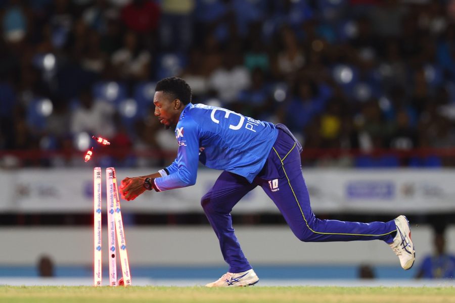 GROS ISLET, SAINT LUCIA - SEPTEMBER 15: Khary Pierre of St Lucia Kings runs out Shamar Springer of Antigua & Barbuda Falcons during the Men's 2024 Republic Bank Caribbean Premier League match between Saint Lucia Kings and Antigua & Barbuda Falcons at the Daren Sammy National Cricket Stadium on September 15, 2024 in Gros Islet, Saint Lucia. (Photo by Ashley Allen - CPL T20/CPL T20 via Getty Images)