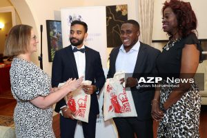 Caption: Scholars -British Deputy High Commissioner Victoria White, left, with Minister of Social Development and Family Services Donna Cox, right, and Chevening scholarship recipients Reyad Mohammed, second left, and Nestor Garcia