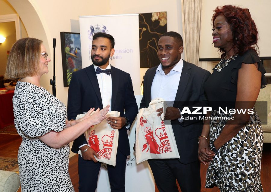 Caption: Scholars -British Deputy High Commissioner Victoria White, left, with Minister of Social Development and Family Services Donna Cox, right, and Chevening scholarship recipients Reyad Mohammed, second left, and Nestor Garcia