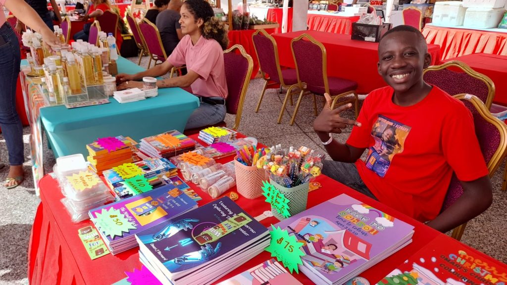 14-year-old author Omari Bernard at his booth