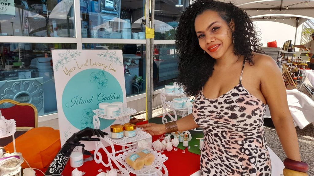 Kalifa Mc Alister displaying her Island Goddess products