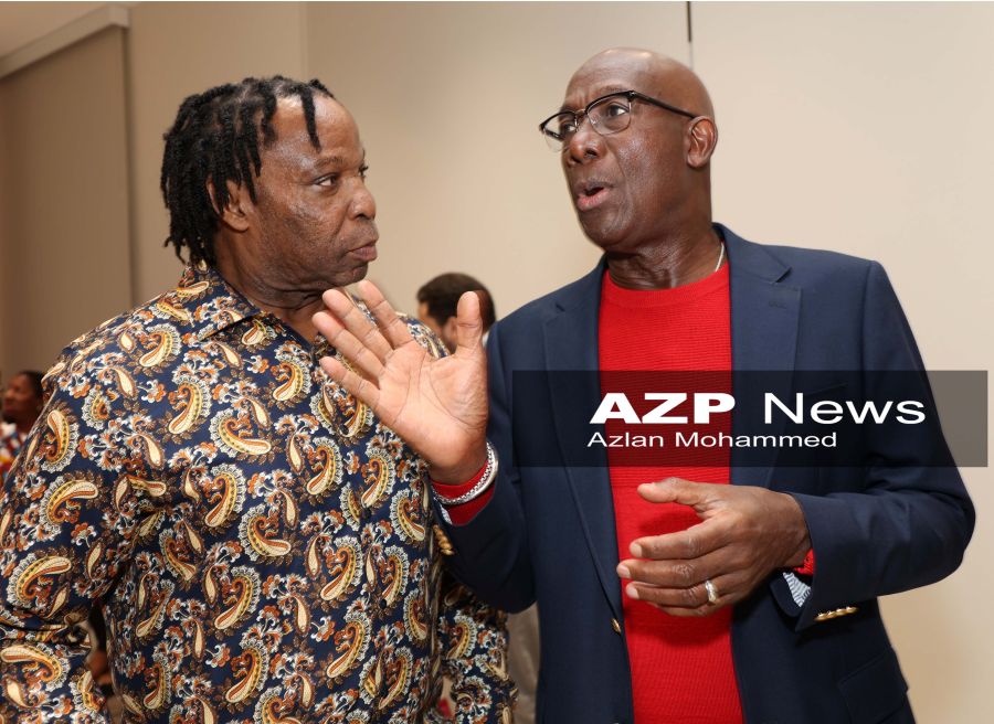 Prime Minister Dr Keith Rowley with Minster in the Ministry of National Security Keith Scotland