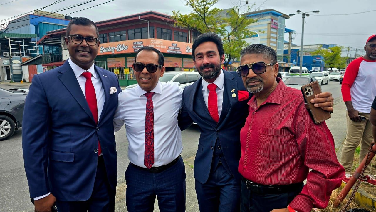 PNM candidate for Chaguanas East Richie Sookhai, second right, after filing nomination papers