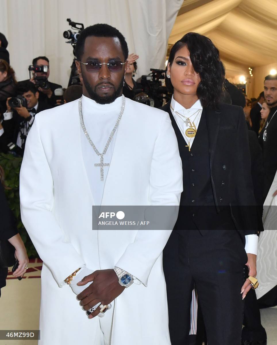 (FILES) Sean Combs (L) and singer Cassie Ventura arrives for the 2018 Met Gala on May 7, 2018, at the Metropolitan Museum of Art in New York. Sean "Diddy" Combs's former partner Casandra Ventura told jurors at the music mogul's sex trafficking trial on May 13, 2025, how he subjected her to "disgusting" and "humiliating" drug-fueled, marathon group sex sessions. Ventura also detailed beatings and abuse at the hands of Combs in bombshell testimony that underpins much of the prosecution's case against the music industry figure, who is alleged to have used violence and blackmail to manipulate women over many years. (Photo by ANGELA WEISS / AFP)