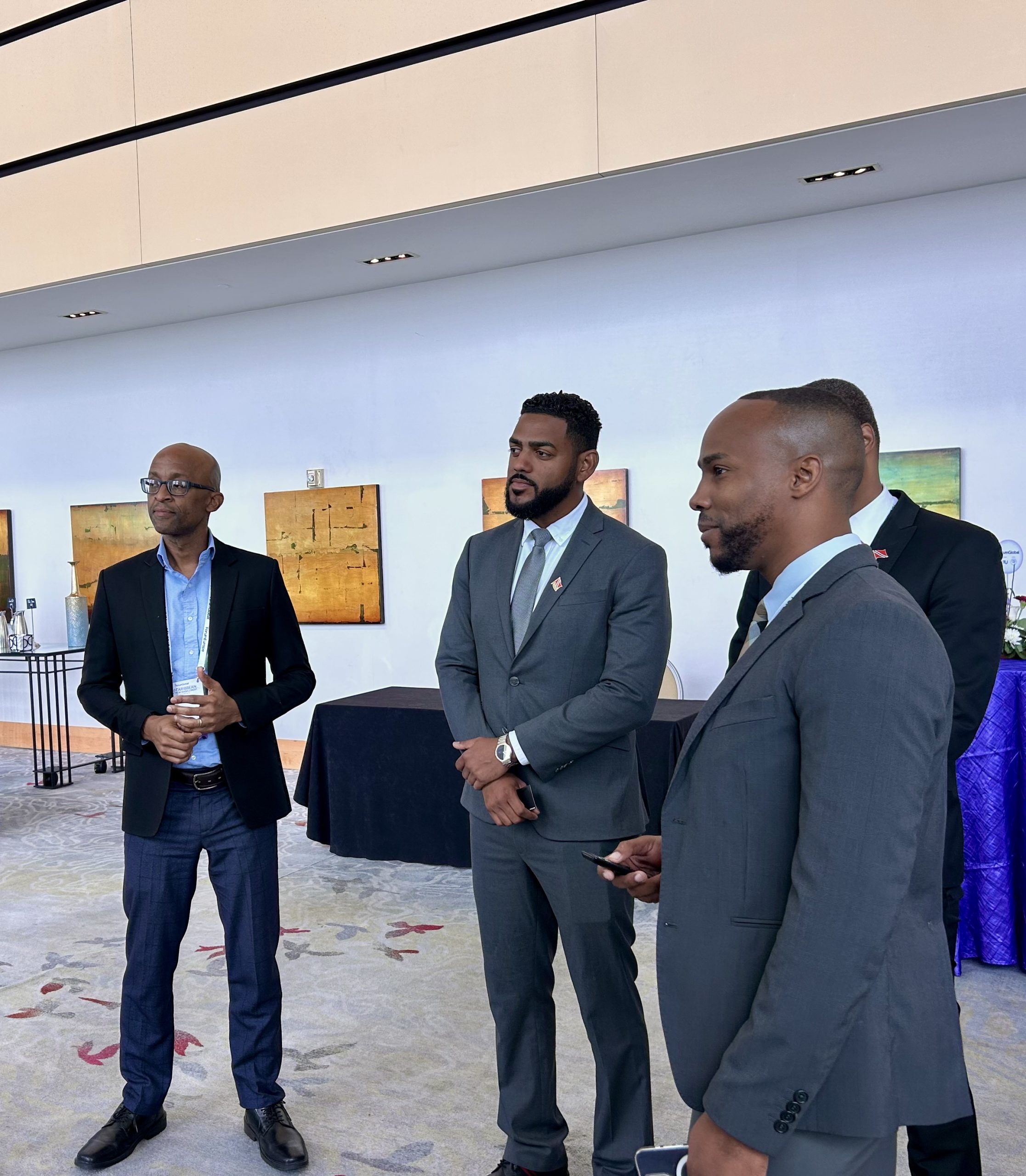 Caption: Public Administration and Artificial Intelligence Minister Dominic Smith, second from left, stands with members of the Telecommunications Authority of Trinidad and Tobago at the 2nd Caribbean Spectrum Management Conference held on Tuesday at the Hyatt Regency, Port of Spain. AZP News/Alicia Chamely