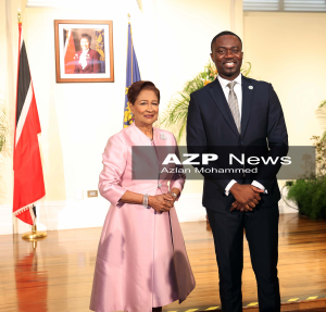 Prime Minister Kamla Persad-Bissessar with THA Chief Secretary Farley Augustine