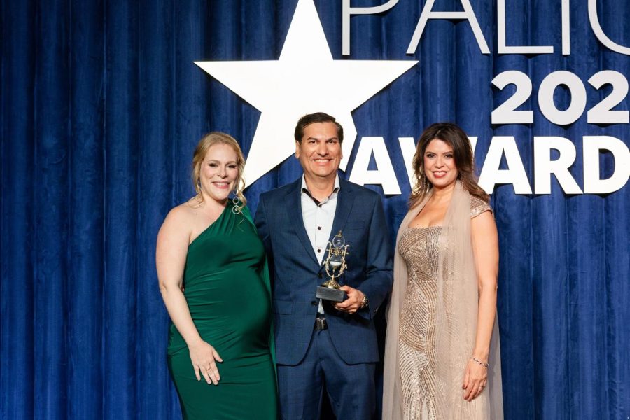 Dr Colin Gosine, centre, with Kristi-Marie Weston Vice President, Regional Corporate Business, left, and Zuleika Tello VP Internacional de Nuevos Negocios Group Internacional