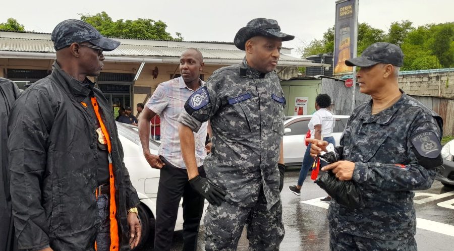 Police Commissioner Allister Guevarro with Deputy Police Commissioner Junior Benjamin, left, in Fyzabad on Thursday. AZP News/Sue-Ann Wayow