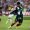 Caption: River Plate's Colombian forward #09 Miguel Borja grabs the jersey of Monterrey's Mexican defender #04 Victor Guzman during the FIFA Club World Cup 2025 Group E football match between Argentina's River Plate and Mexico's Monterrey at the Rose Bowl stadium in Los Angeles on Saturday
