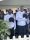 Former acting Commissioner of Police Junior Benjamin, left and newly appointed Commissioner of Police Allister Guevarro bow their heads in silence during the opening prayer of Guevarro's appointment ceremony on Tuesday at the Police Barracks, St James. AZP News/Alicia Chamely