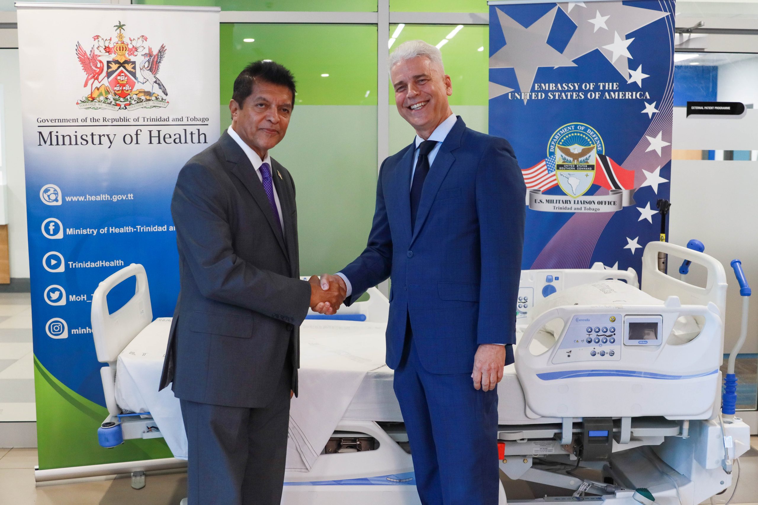 Caption:  US Embassy Deputy Chief of Mission (DCM) Charlie Franta and Minister of Health Dr Lackram Bodoe at the donation of medical supplies to the Ministry of Health