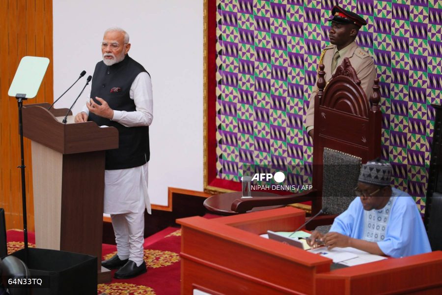 Indian Prime Minister Narendra Modi (L) addresses lawmakers at the Parliament of Ghana during his two-day visit to Accra, on July 3, 2025. Prime Minister Narendra Modi arrived in Ghana on July 2, 2025, the first Indian leader to visit the cocoa-rich country in three decades as the Asian nation competes with China and Russia for economic influence in Africa. (Photo by Nipah Dennis / AFP)