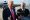 Caption: US President Donald Trump, left, flanked by US Secretary of Commerce Howard Lutnick, speaks to reporters after stepping off Air Force One upon arrival at Joint Base Andrews, Maryland on July 15, 2025