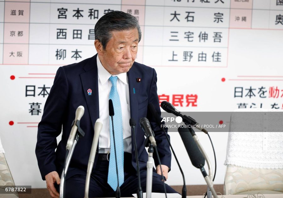 Caption: Ruling Liberal Democratic Party (LDP) secretary general Hiroshi Moriyama reacts as he arrives at the LDP headquarters in Tokyo on July 20, 2025