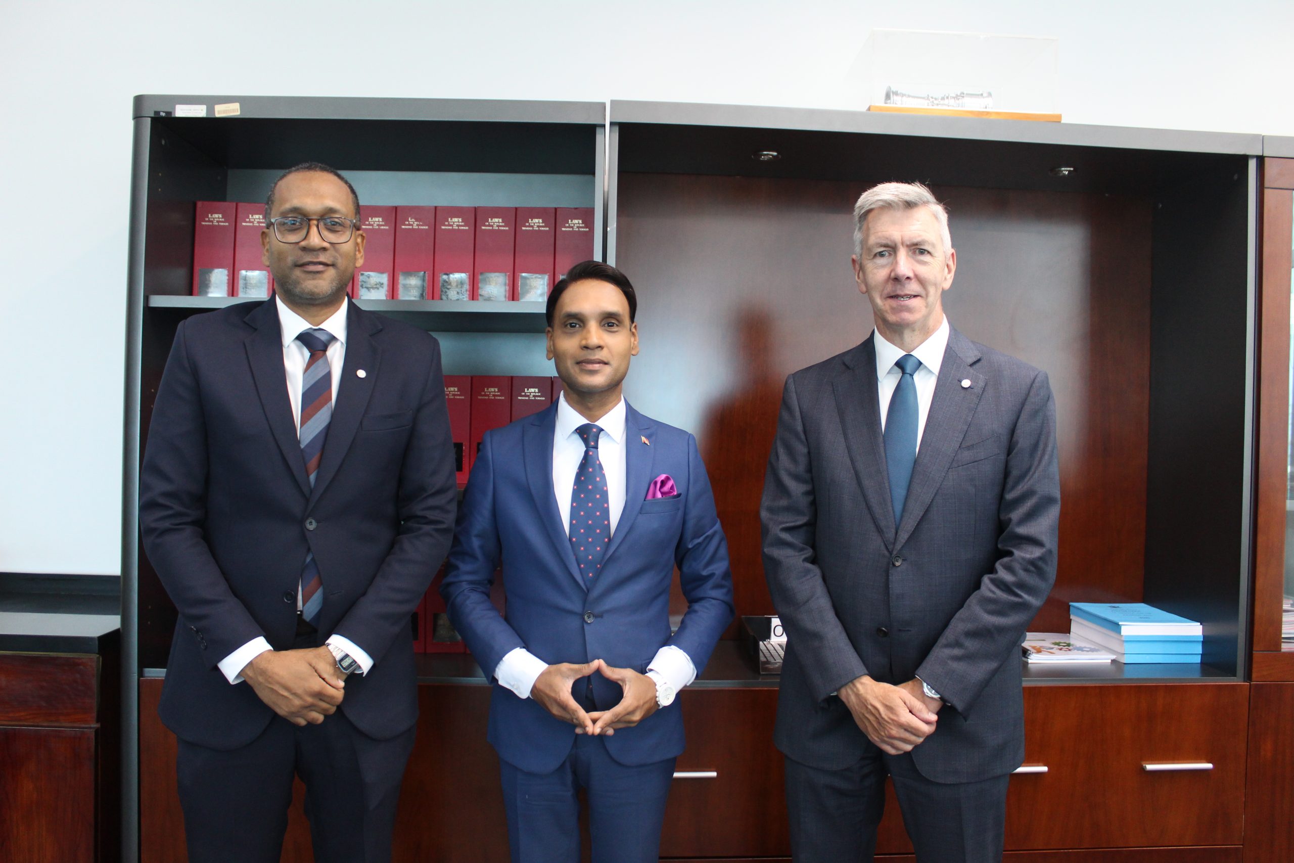 From left, Vice President of Communications and External Affairs Ryan Chaitram, Minister of Public Utilities Barry Padarath, President of bpTT David Campbell