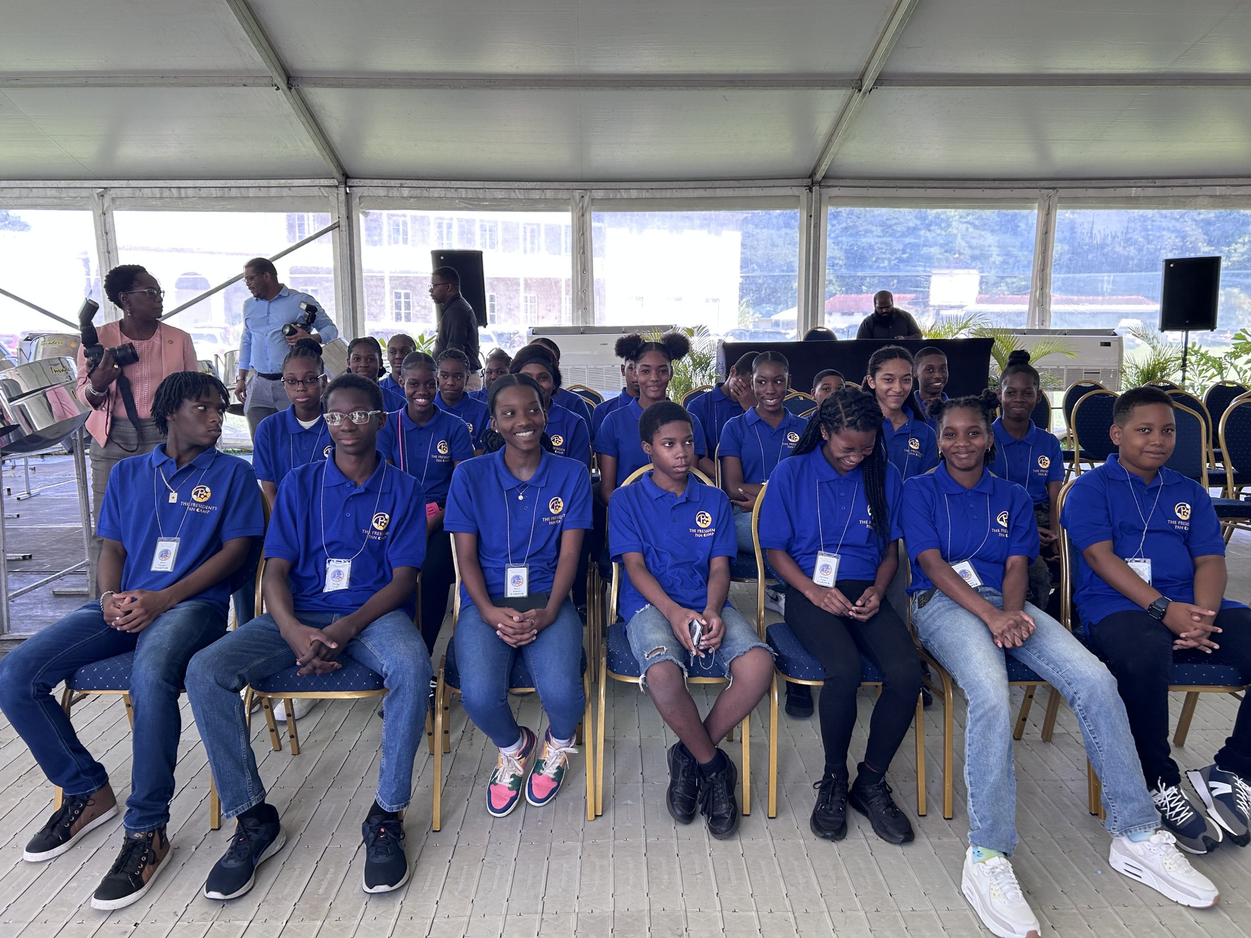 Caption: Students attend the first session of the President's Pan Camp on Monday at the President's House, St Ann's. AZP News/Alicia Chamely