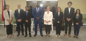 Homeland Security Minister Roger Alexander with members of the UNDP