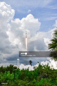 Caption: A SpaceX Falcon 9 rocket with the Crew Dragon capsule Endeavour carrying the Crew-11 mission lifts off from Launch Complex 39A at NASA's Kennedy Space Center in Florida on August 1, 2025