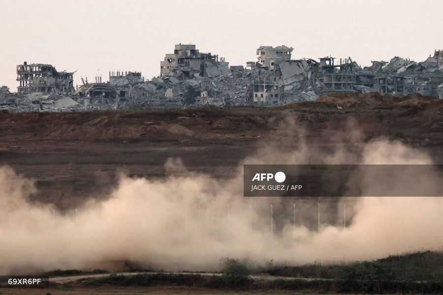 This picture taken from a position on the Israeli border with the Gaza Strip, shows destroyed buildings in the besieged Palestinian territory on August 19, 2025