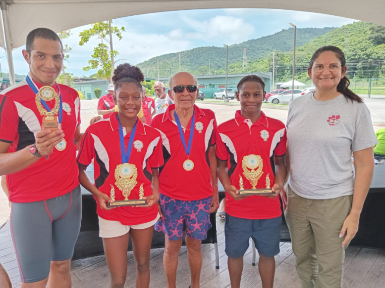 From left: Trent Trent Bethel, Marena Martinez, TMSC President Gordon Borde, Marena Martinez and Dinora Gil of ASATT. AZP News/Prior Beharry