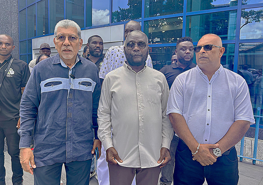 Caption: TTSIDA President Alan Ferguson, centre, flanked by David Abdullah, left, and TTSIDA Vice President Erros Seejattan is calling for an urgent meeting between the Association and Minister of Trade, Industry and Tourism Satyakama Maharaj. AZP News/Alicia Chamely