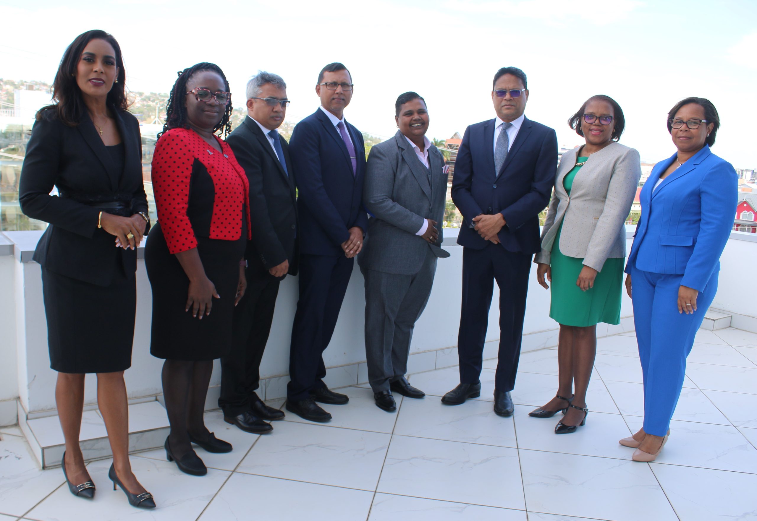Caption: From left, Ria Mohammed; Shervonne Bruno-Pierre; Anand Singh; Ashook Balroop, Renuka Rambhajan, chairman, Minister  of Justice Devesh Maharaj; Permanent Secretary Trudy Lewis and acting Permanent Secretary Ayanna Gaspard-Clarke. Absent are Deborah Moore-Miggins and Satie Maniram-Khodai.